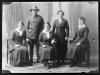 Arthur Ching in uniform with his mother and three sisters, Nelson, NZ